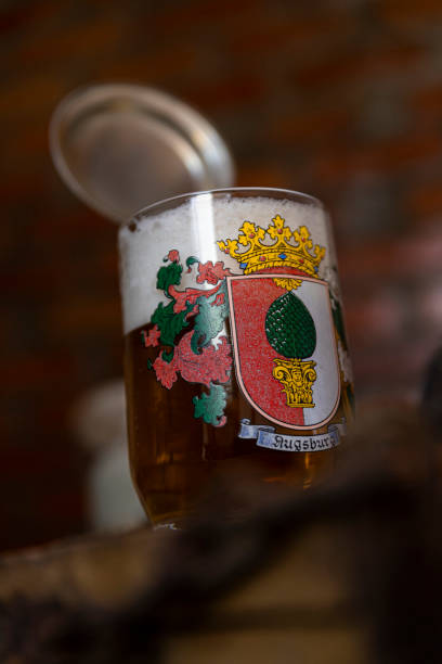 istock Traditional German beer stein with a silver lid 1253858223