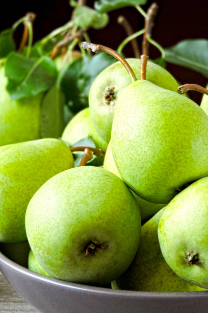 istock Fresh green pears in a bowl. 1253862301