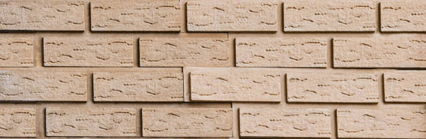 istock Texture of a stone wall. Old castle stone wall texture background. Stone wall as a background or texture. Part of a stone wall, for background or texture 1253874725