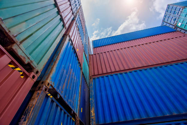 istock Container port for international maritime transport. Cargo freight ship for import and export, transport. 1253875383