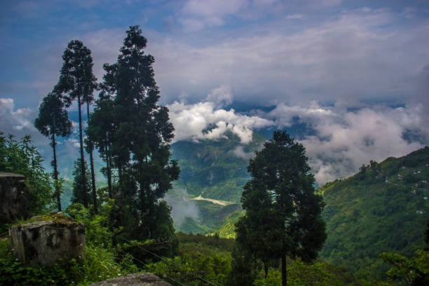 istock Mountain valley with lots of cloud s 1253876955