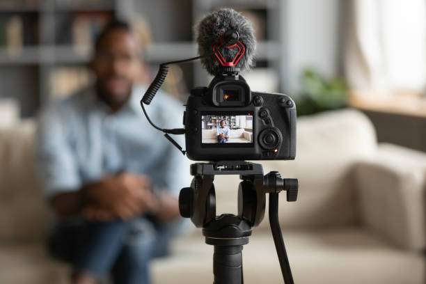 istock African man recording new vlog, closeup view digital camera screen 1253877750