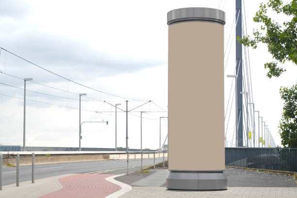 istock blank advertising pillar,public advertising display, outside setting, free copy space 1253878701
