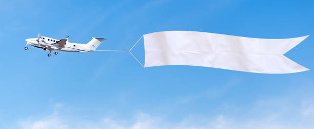 istock Airplane advertising banner 1253879061
