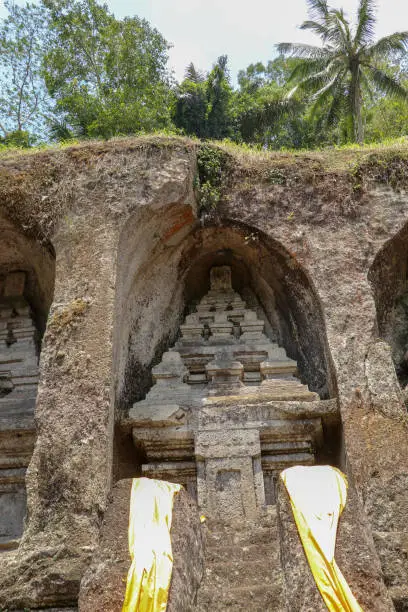 Photo of These funeral monuments are thought to be dedicated to King Anak Wungsu of the Udayana dynasty and his favorite queens. Gunung Kawi is an 11th-century temple and funerary complex in Tampaksiring.