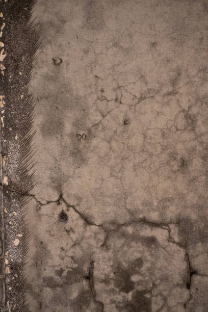 istock The texture of the Cracks on the white concrete wall 1253881954