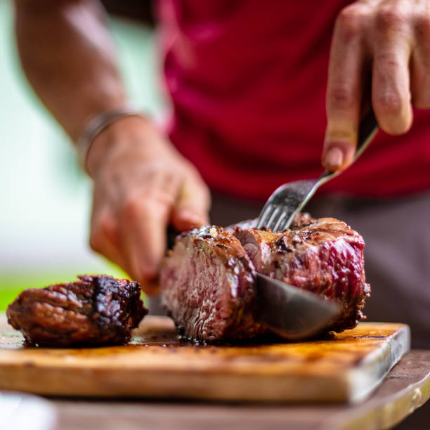 istock barbeque meat preparation in a summer day 1253884525