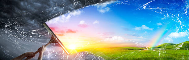 istock Hand Wiping The Cloudy Sky For A New Better World - Clean Environment Concept 1253884963