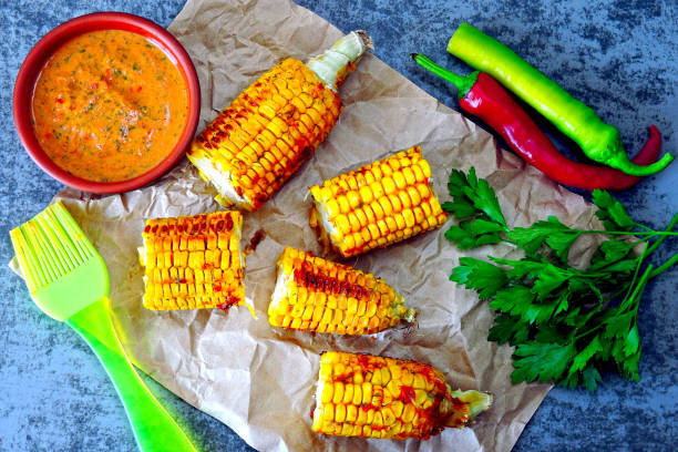 istock Baked corn with chili sauce. 1253886689