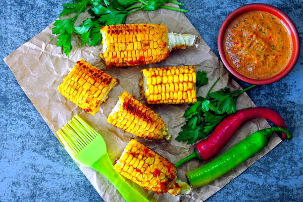 istock Baked corn with chili sauce. 1253886691