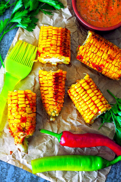 istock Baked corn with chili sauce. 1253886694