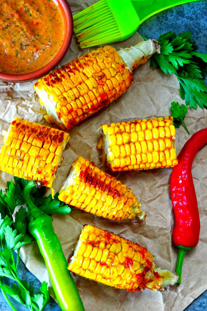istock Baked corn with chili sauce. 1253886695