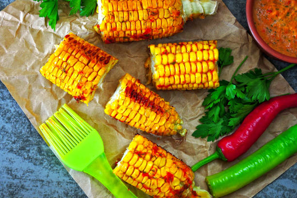 istock Baked corn with chili sauce. 1253886698