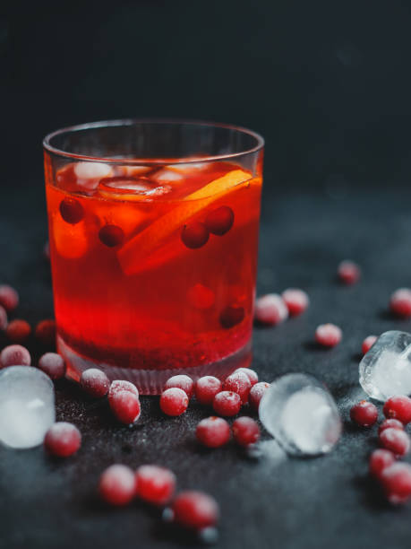 istock Spritz with ice and cranberries on a black background. 1253888822