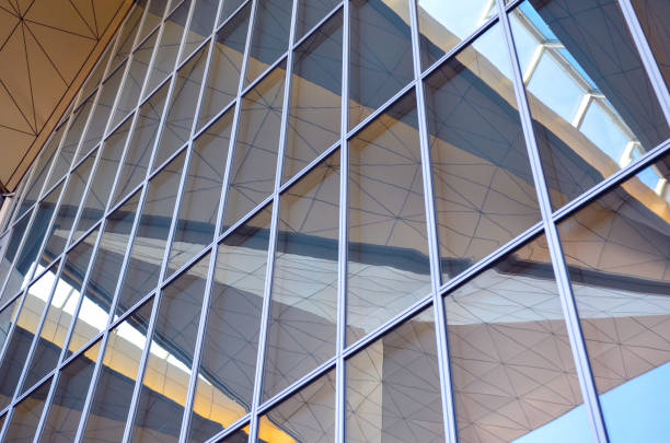 istock reflection of a modern building in the windows 1253889257