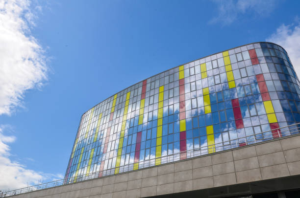 istock Large building with colorful windows 1253889292