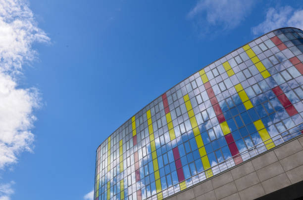 istock Large building with colorful windows 1253889308