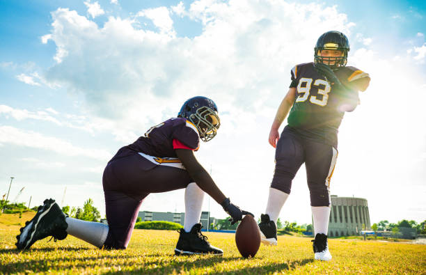 istock Junior Football players during game 1253891460