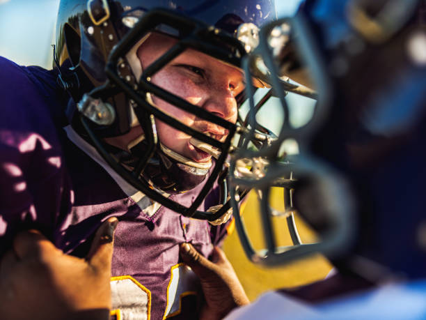 istock Junior Football players during game 1253891512