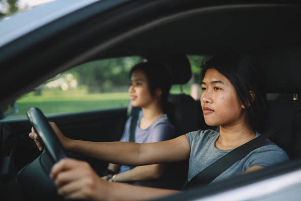 istock Two girls on a car ride 1253891566