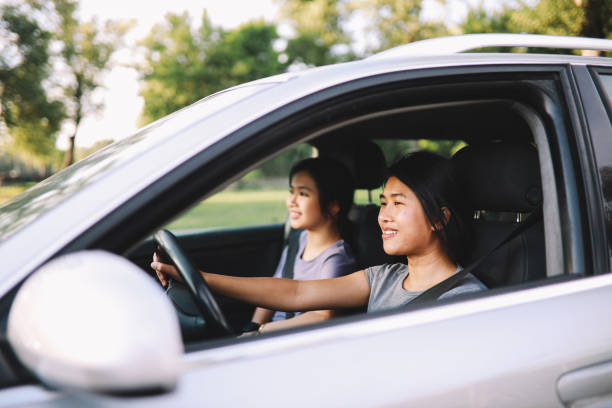 istock Two girls on a car ride 1253892233