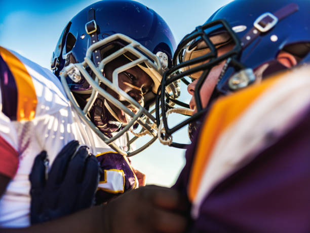 istock Junior Football players during game 1253892345