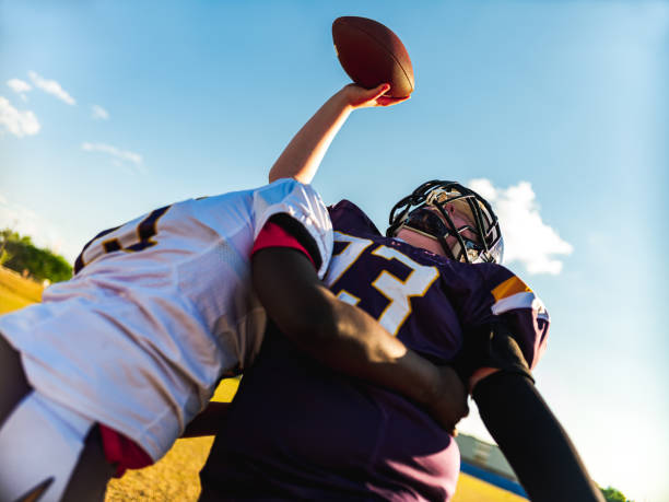istock Junior Football players during game 1253892388