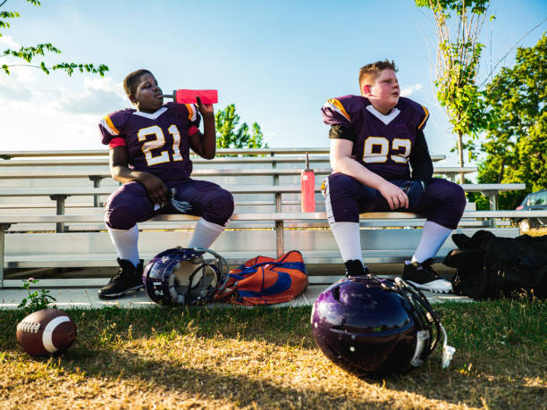 istock Junior Football players drinking water 1253892414