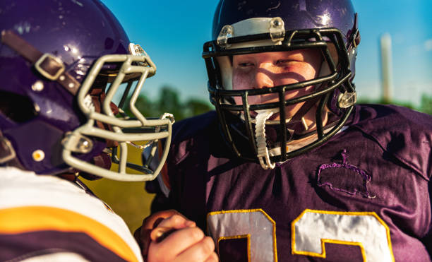 istock Junior Football players during game 1253892630