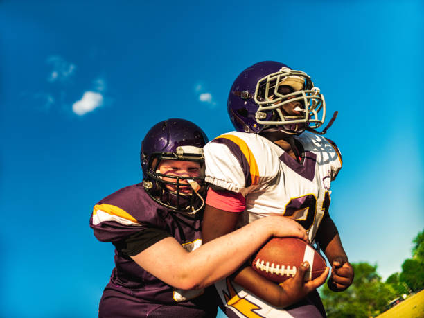 istock Junior Football players during game 1253892757