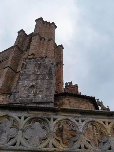 istock Cathedral walls and towers on a cloudy day 1253892863