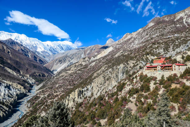 istock Tilicho Base Camp - A temple with the view on snow capped Himalayas 1253893665