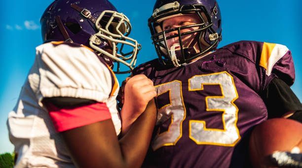 istock Junior Football players during game 1253893909