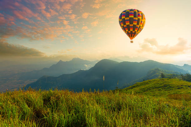 istock Hot air balloons with landscape mountain 1253894301