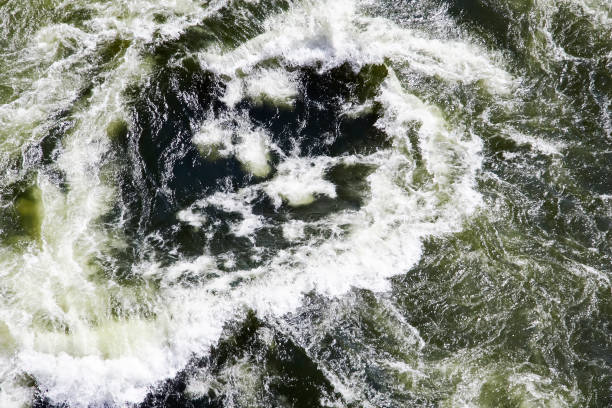 istock The surface texture of a stream of clear river water when viewed from above. 1253897439