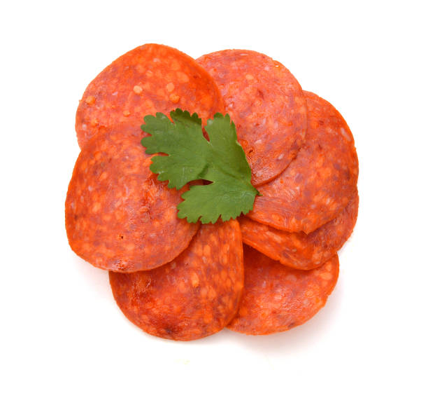 istock slices of pepperoni on white background 1253897718