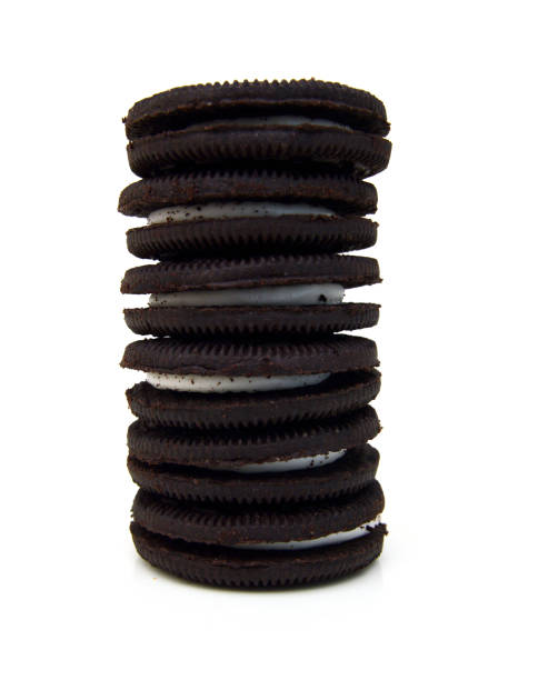 istock Sandwich cookies with cream on white background 1253899102