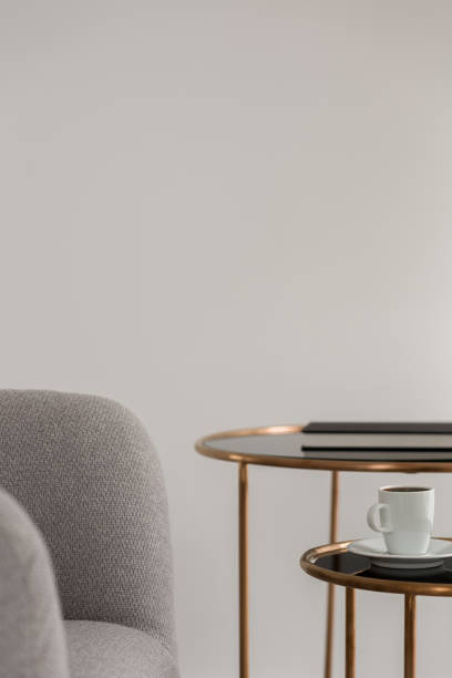 istock Armchair and two coffee tables 1253903546