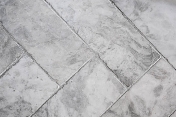 istock Gray floor tiles, close-up 1253903549