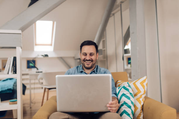 istock Freelancer working from his living room 1253904462