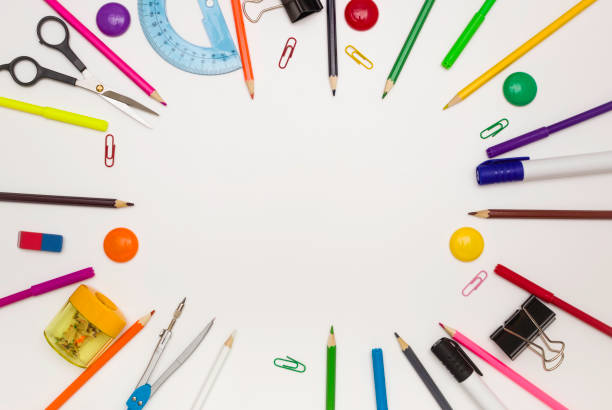 istock Education, office, and object concept. Stationery frame on a white background. Free space for text, top view. 1253905658