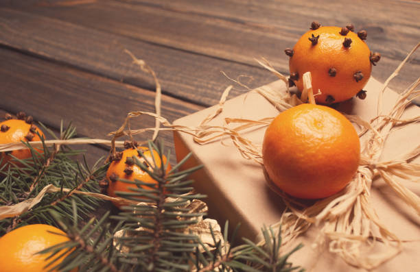 istock Christmas New Year composition with tangerines and pine cones 1253908809