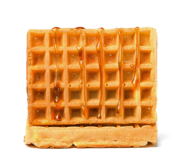 istock biscuit waffles with maple syrup on a white background 1253910533