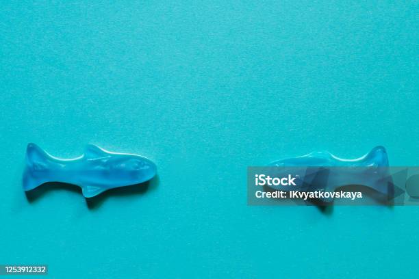 Blue Jelly Sweets Top View Delicious Marmalade Candy In The Shape Of Fish On Blue Background With Copy Space Stock Photo - Download Image Now