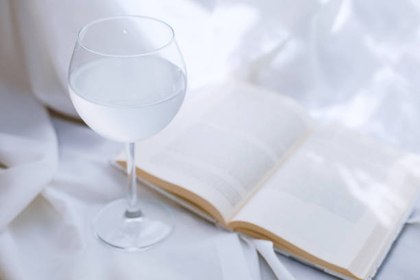 istock Glass of water and book 1253913518