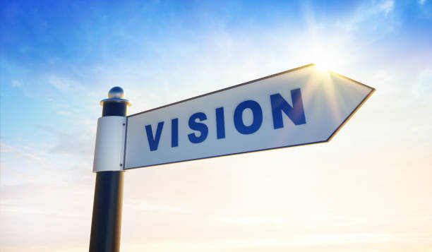 Signpost over evening sky Signpost over evening sky with the word vision crossroads sign stock pictures, royalty-free photos & images