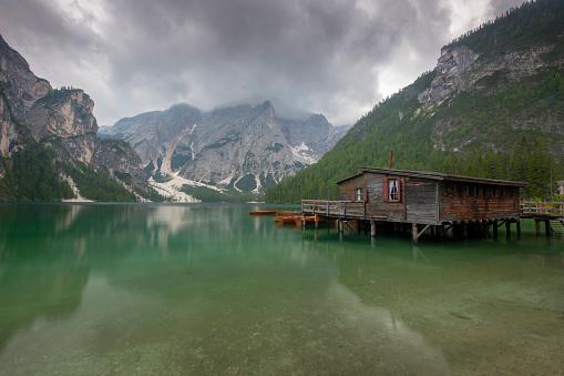 lake of braies with a hut , long exposure  with bad weather, Dolomiti Italy