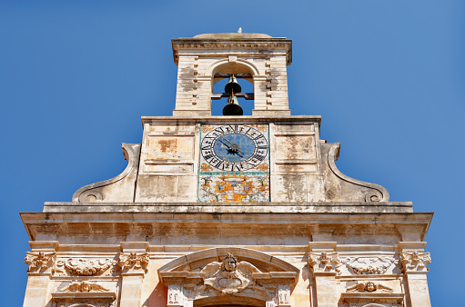 Part of the Sanctuary of the Santissima Annunziata facade  in Gaeta , beautiful bell tower  with Maiolica clock made by Matteo De Vivo