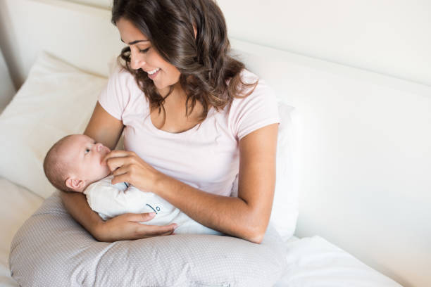 istock Mother with baby 1253920150