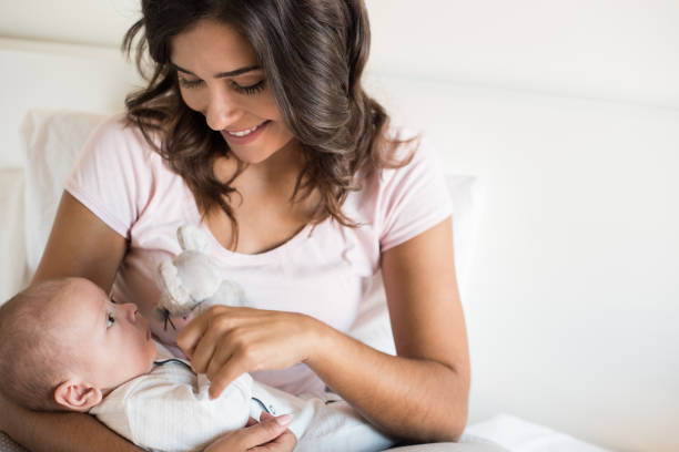 istock Mother with baby 1253920163